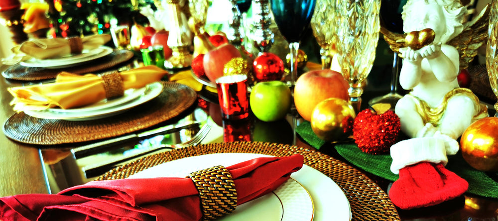 Festive Christmas table setting featuring a napkin ring and placemat